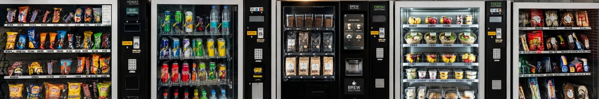 Verschiedene Verkaufsautomaten mit Snacks, Getränken, Kaffee und frischen Lebensmitteln